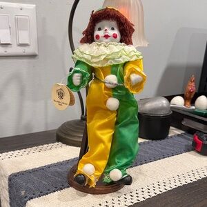 Colorful Clown Porcelain Clown Figurine with Green and Yellow Outfit on Stand